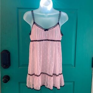 Victoria’s Secret medium light pink baby doll with black detailing.